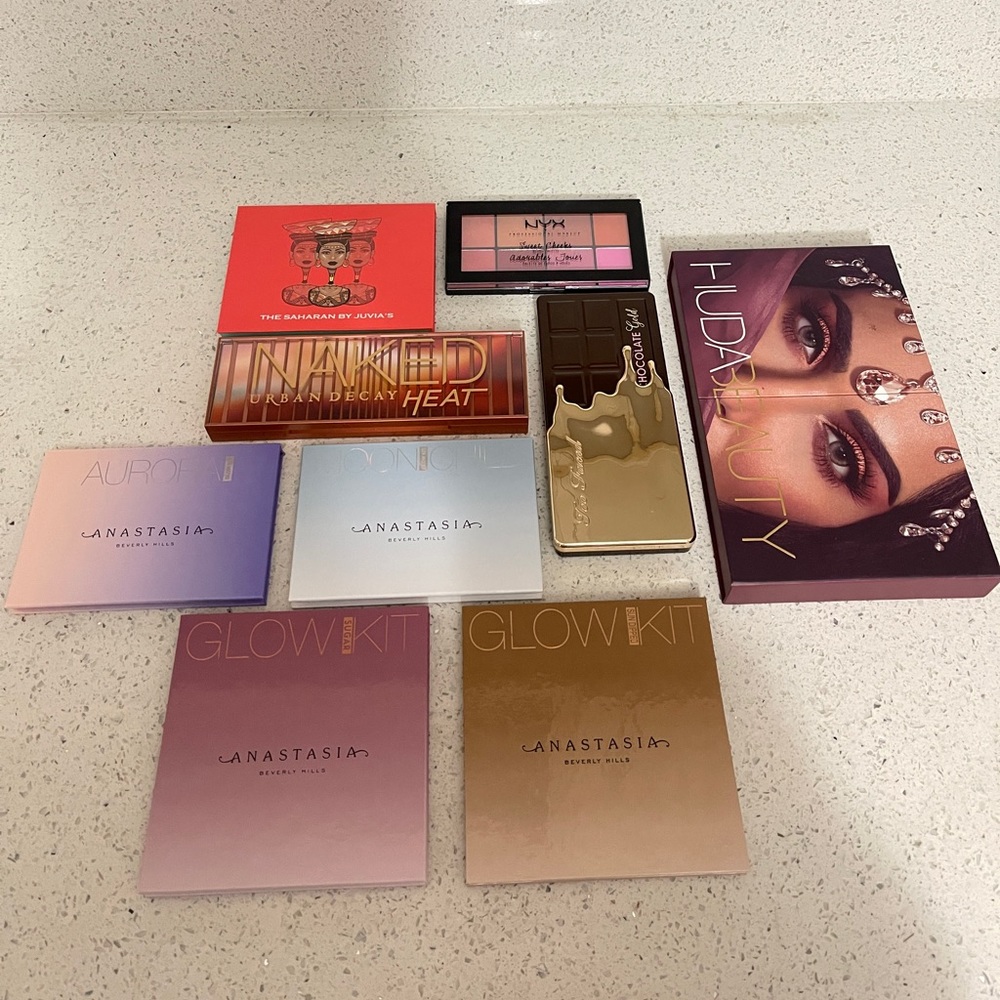 Eyeshadow, highlight, blush palettes (swatched lightly)